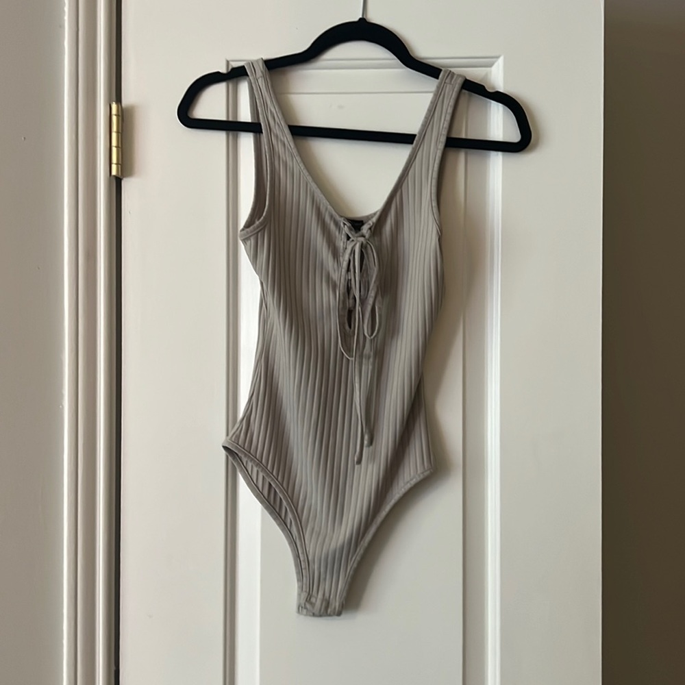 Gray body suit